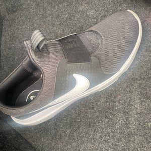 Nike. Size 10. Used as new.  Bought it brand new at Nike store and seems tight.